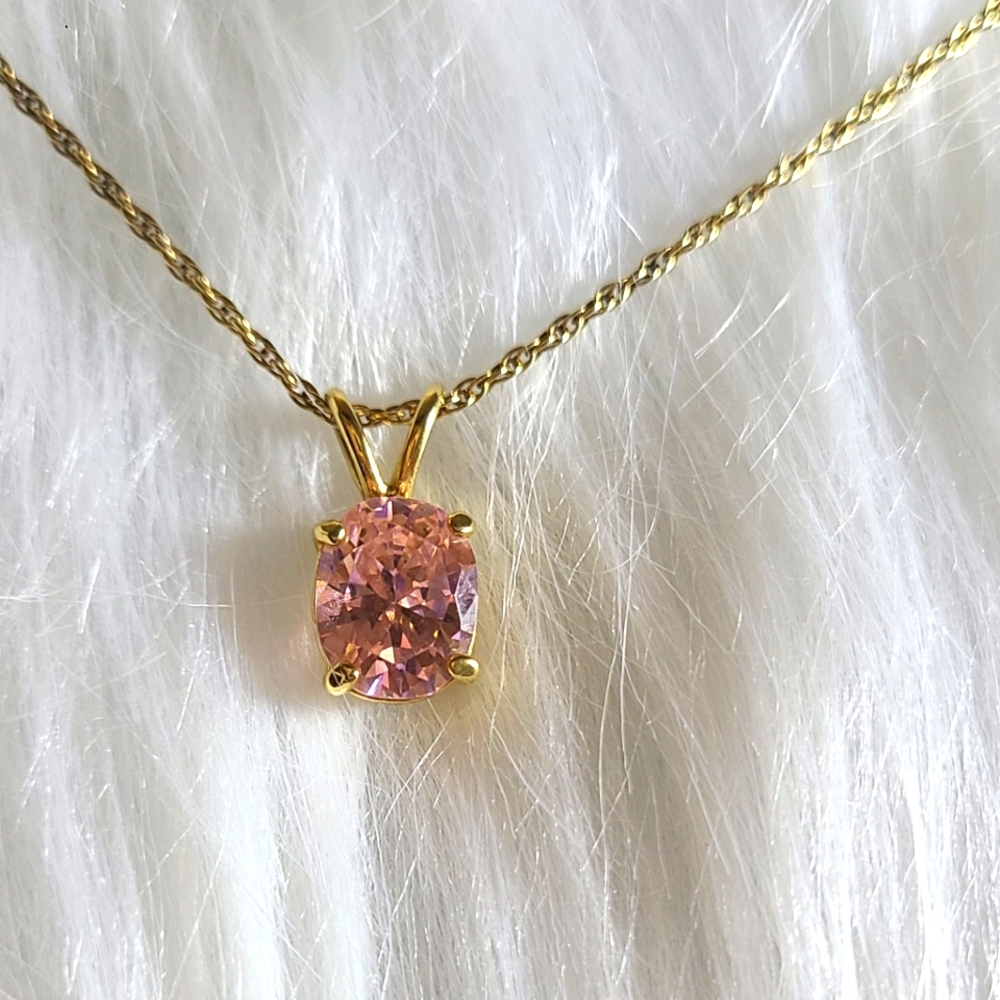 5.6ct Oval Pink Topaz Slide Pendant on approx. 18inch Rope Chain